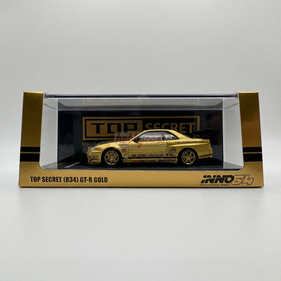 Inno64 Nissan Top Secret (R34) GT-R Gold (Damaged)